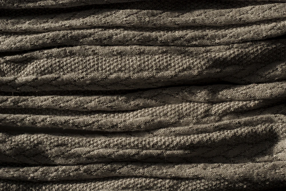 Foto referencial: Textura suave de una tela tejida